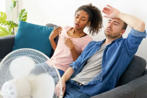 a man and a woman sitting on a couch