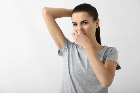 a person with the hand on the face