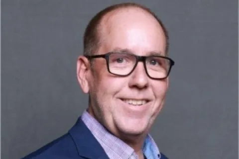 a man wearing glasses