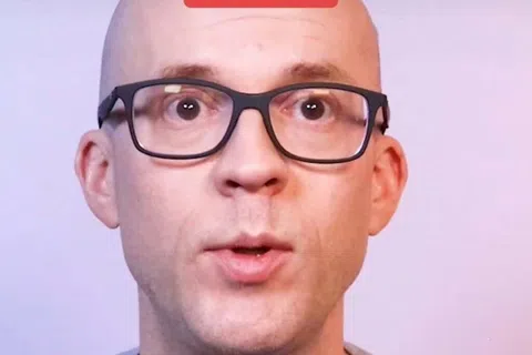 a man wearing glasses