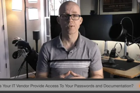 a person sitting in front of a computer