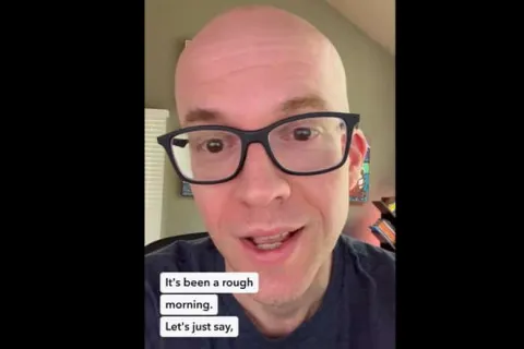 a man wearing glasses