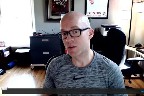 a man sitting at a desk
