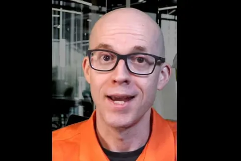 a man wearing glasses