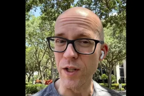 a man wearing glasses