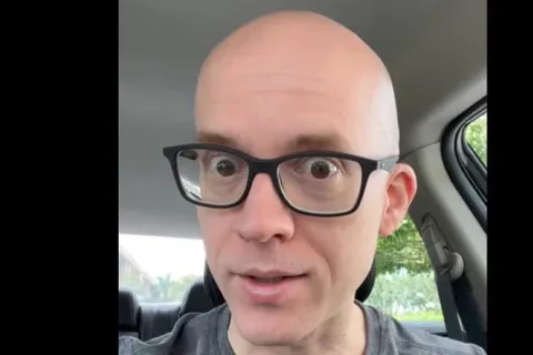 a man wearing glasses