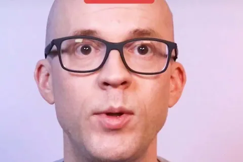 a man wearing glasses