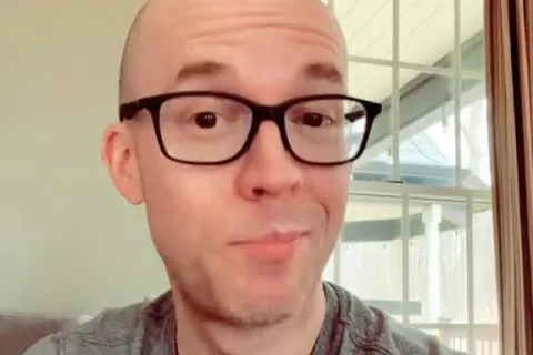 a man wearing glasses