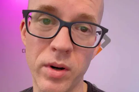 a man wearing glasses
