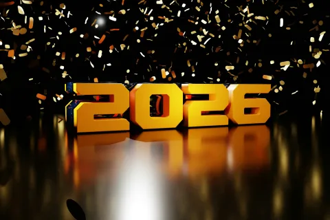 Golden 3D numbers 2026 with falling confetti on a reflective black surface celebrating the new year