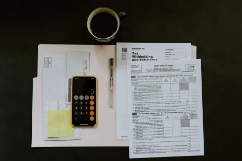a cell phone on a piece of paper