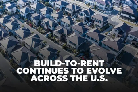 Aerial view of suburban houses with text about build-to-rent housing evolution across the U.S.