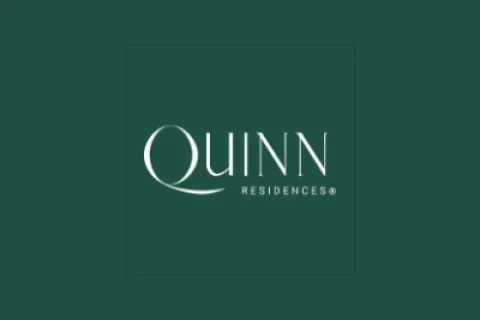 Quinn Residences logo with elegant white text on a dark green background.