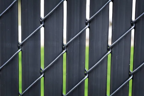 Chain Link Fence with Slats for Functional Privacy