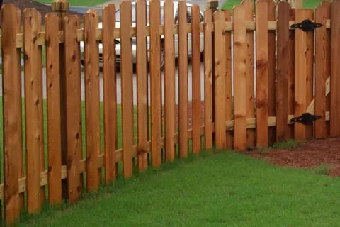 Pros and Cons of Using Pressure Treated Lumber for Your Fence