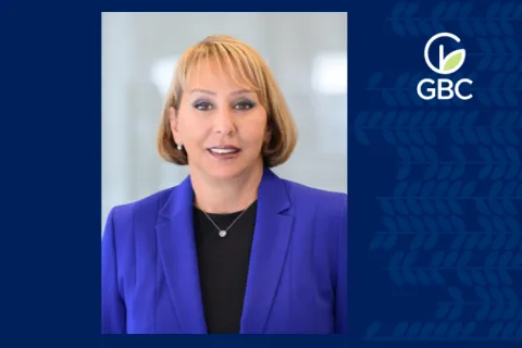 a woman smiling for the camera