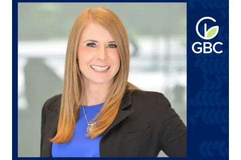 a woman smiling for the camera