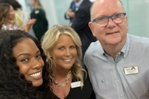 a group of people posing for a photo