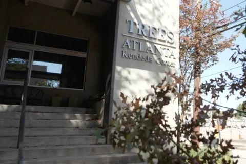 a building with trees in front of it