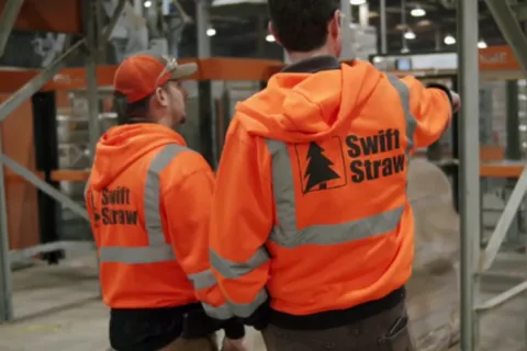 a white pillow on a shelf