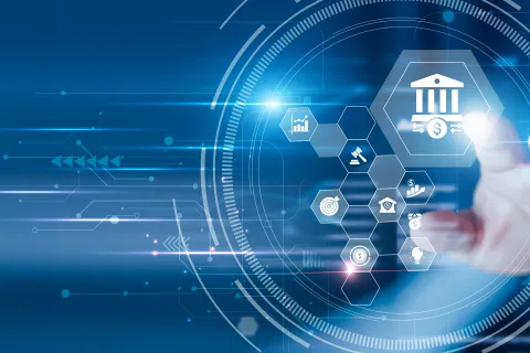 Hand interacting with futuristic touchscreen interface showing financial icons and bank symbols on blue background