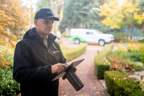 a man holding a laptop