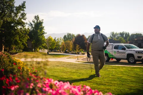 a man walking in a garden