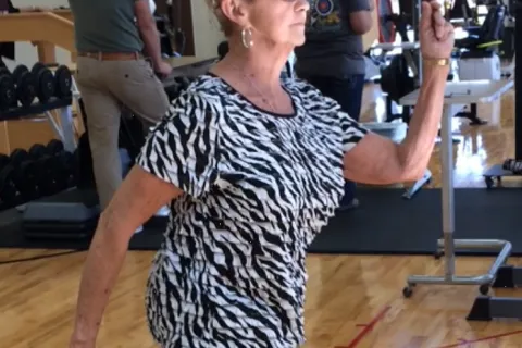 a person dancing in a gym