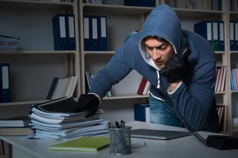 a person in a blue hoodie