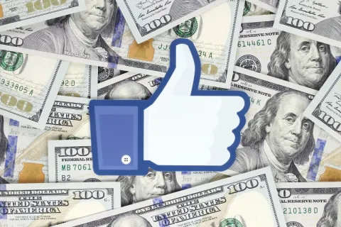 dollar bills and a thumbs up icon