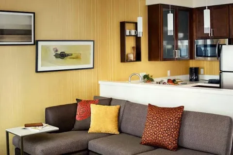 a living room with a couch and a table