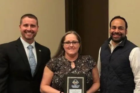 a group of people posing for a photo
