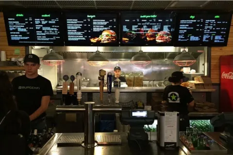 a group of people in a restaurant