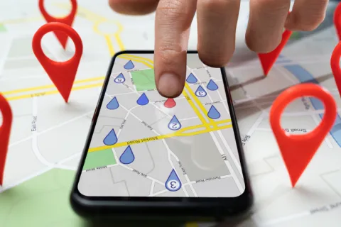 a hand holding a card