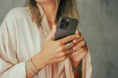 a woman holding a camera