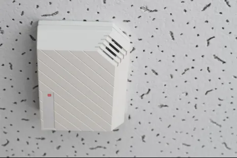 a white box with a red light