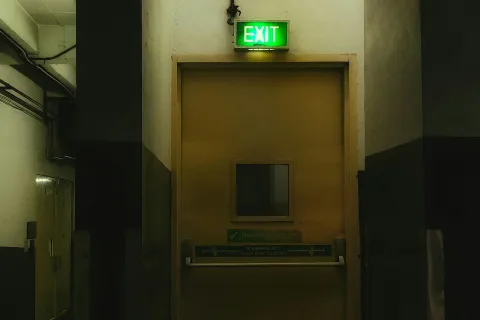 a large elevator with a green light