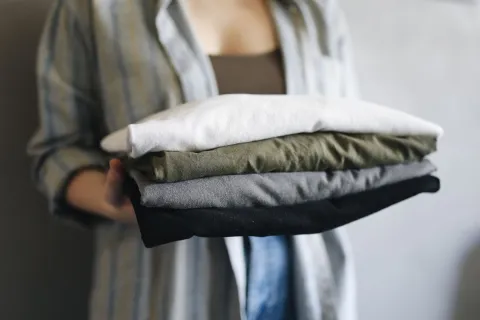 a person holding a towel
