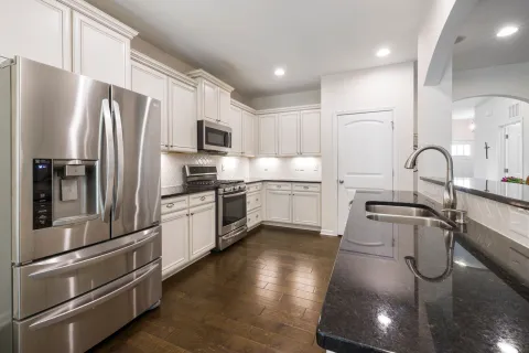 a kitchen with stainless steel appliances