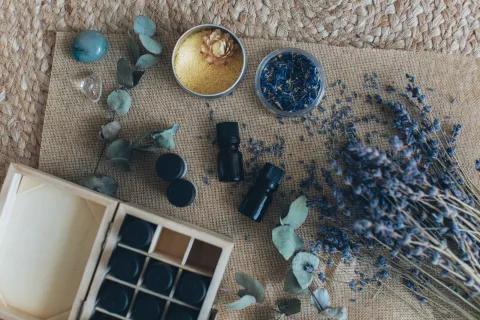 a table with a bowl of food and objects on it