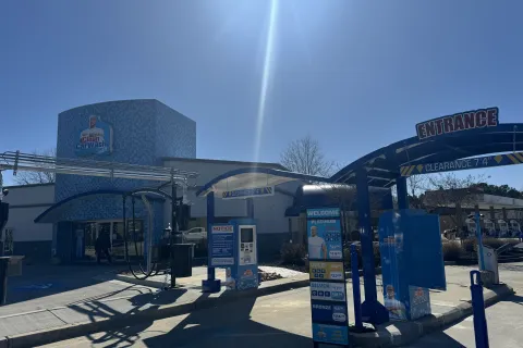 a gas station with a fountain