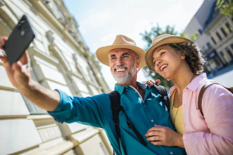a man and woman taking a selfie