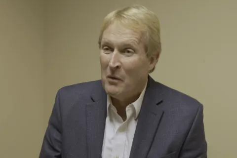 Kevin Kane in a suit