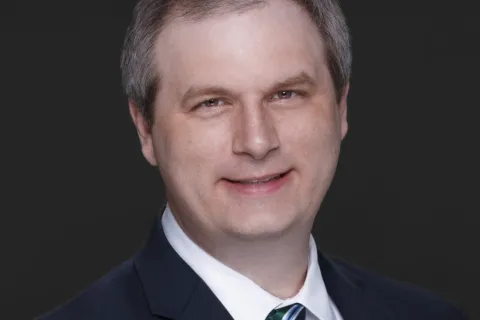 a man in a suit and tie