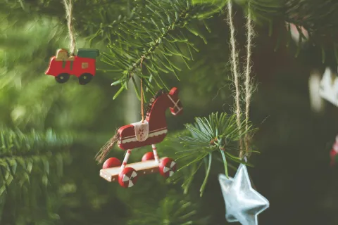 a toy train on a tree