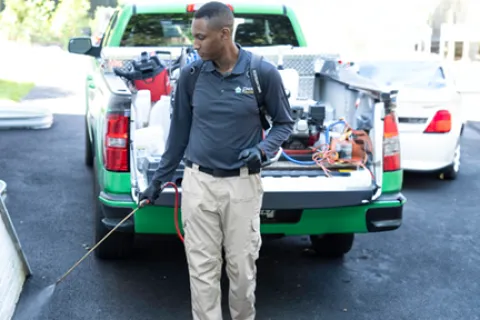 a man with a sprayer
