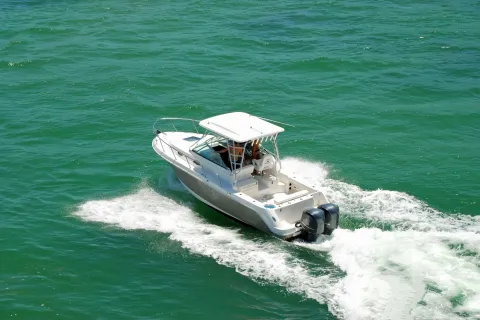 a boat travels through the water