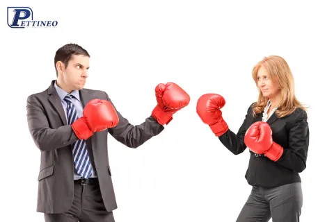 a man and woman wearing boxing gloves