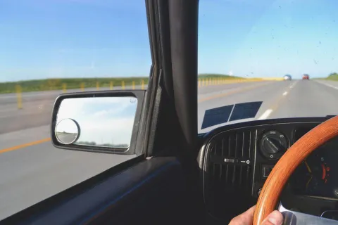 a person driving a car