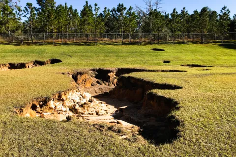 a pile of dirt in a field